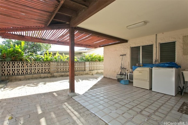 view of patio / terrace with separate washer and dryer