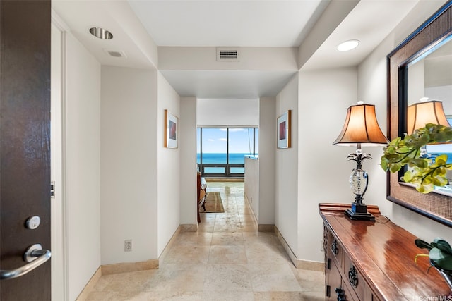 1330 Ala Moana Blvd Unit 3204, Honolulu, HI 96814 - corridor featuring baseboards and a water view