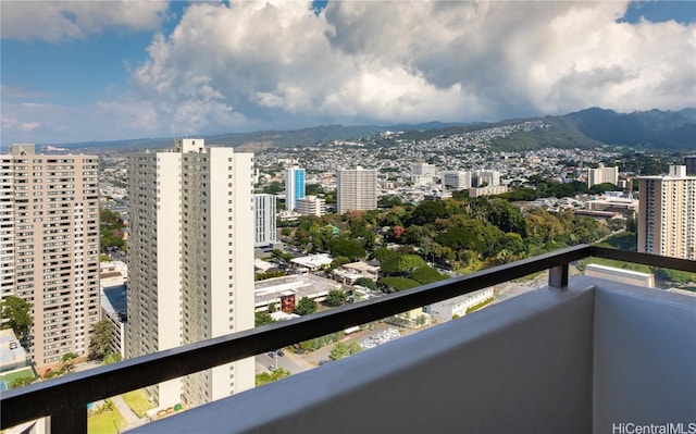 balcony featuring a mountain view