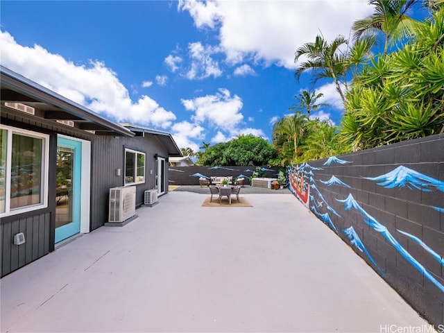 view of patio featuring ac unit