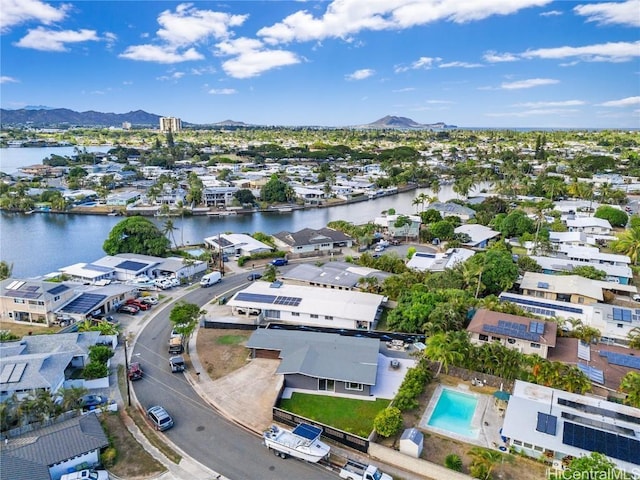 aerial view featuring a water and mountain view