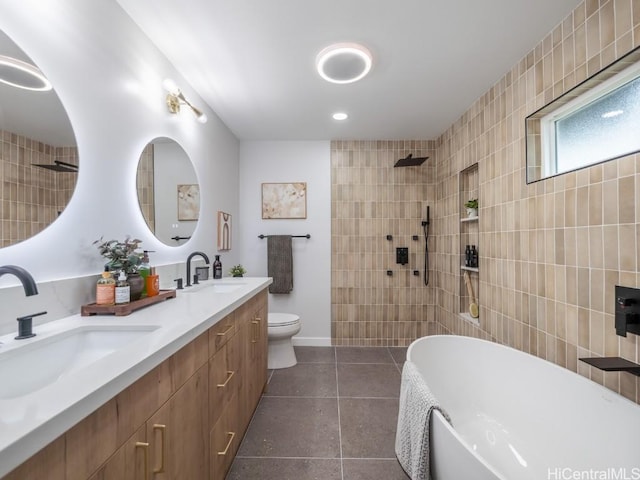 full bathroom featuring vanity, tile patterned floors, plus walk in shower, and toilet