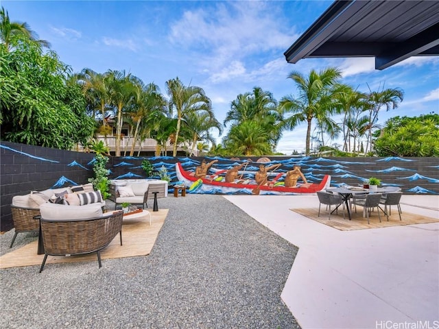 view of pool with an outdoor living space and a patio area