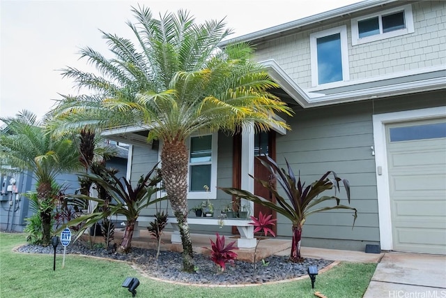 view of exterior entry featuring a garage