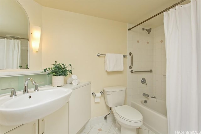 full bathroom with shower / bathtub combination with curtain, sink, tile patterned floors, and toilet