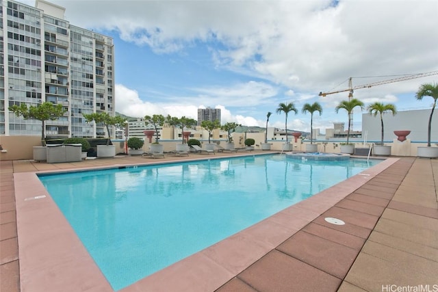 view of pool featuring a patio area