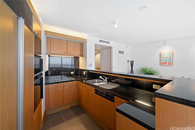 kitchen featuring dishwasher, sink, oven, kitchen peninsula, and paneled fridge