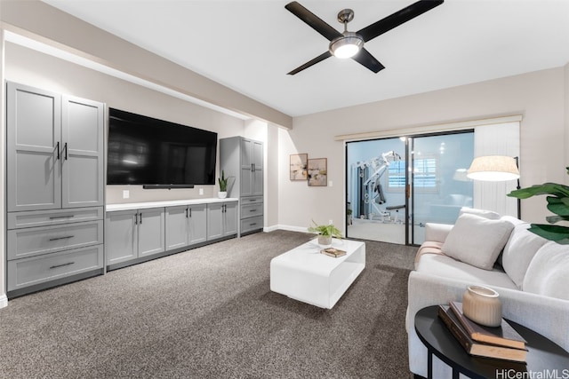 living room featuring carpet floors and ceiling fan