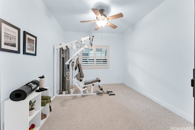 workout room with carpet and ceiling fan