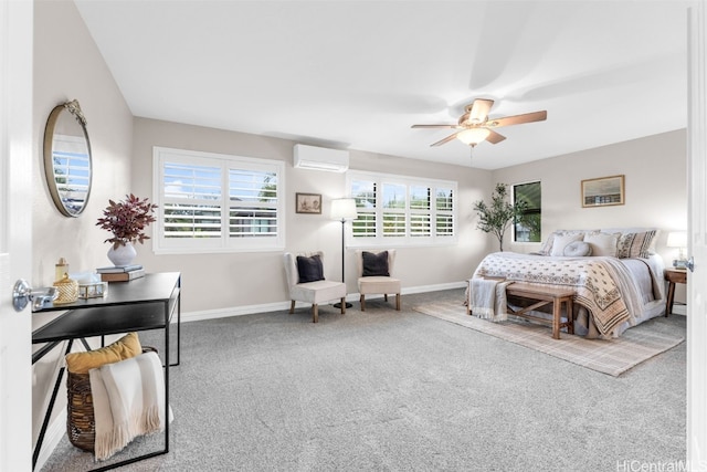 bedroom featuring multiple windows, ceiling fan, carpet floors, and a wall unit AC