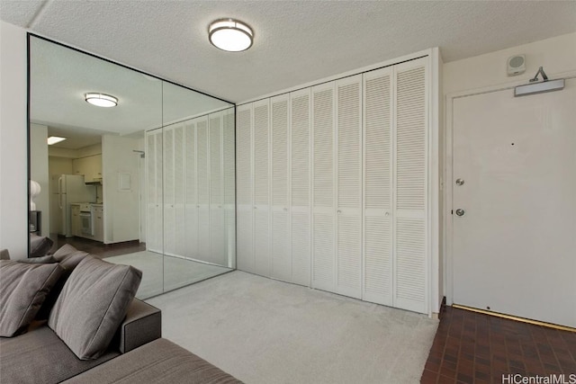 bedroom with white fridge