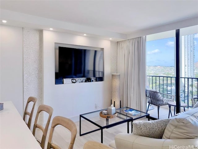 living room with floor to ceiling windows