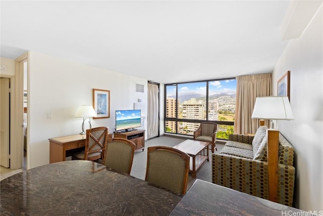 living room with floor to ceiling windows