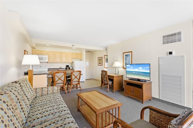 living room with light colored carpet