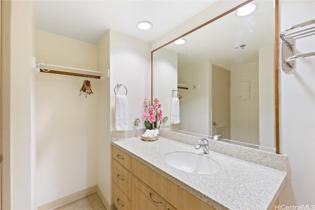 bathroom featuring tile patterned floors and vanity