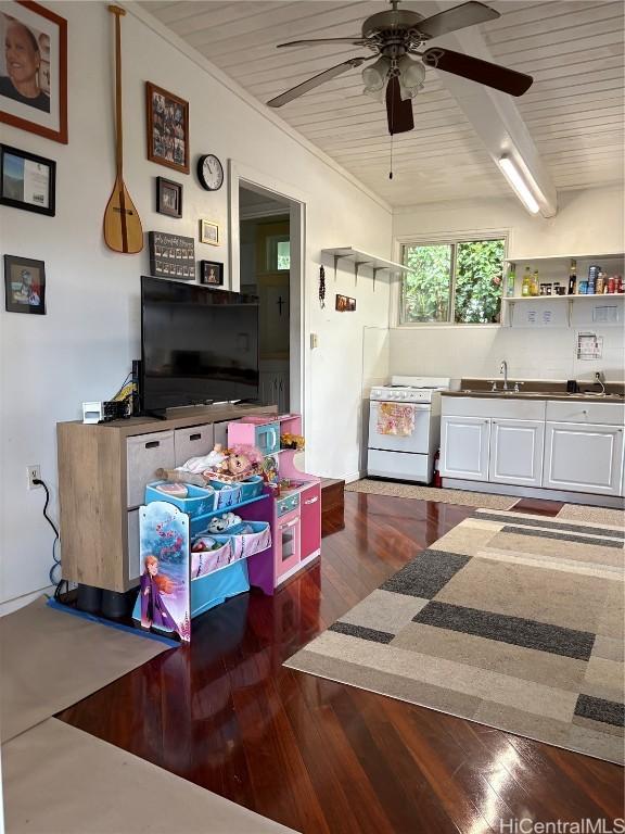 kitchen featuring dark wood-style floors, electric range, and wood ceiling