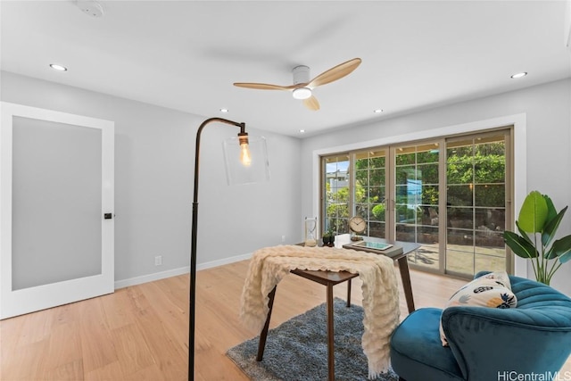 interior space featuring french doors, ceiling fan, and light hardwood / wood-style flooring