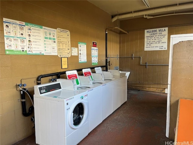 clothes washing area with washer and dryer