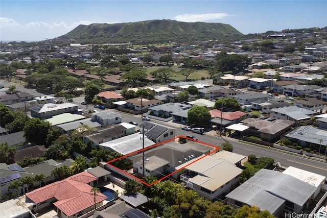 drone / aerial view featuring a residential view and a mountain view