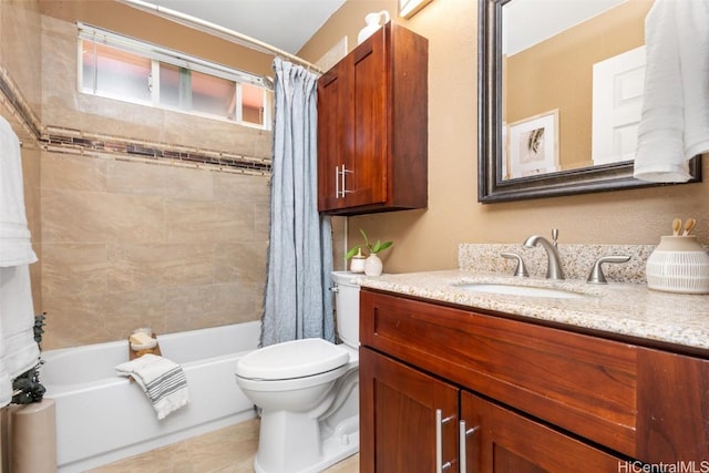 full bathroom featuring vanity, toilet, and shower / tub combo