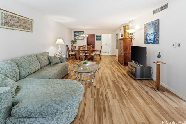 living room with light hardwood / wood-style flooring