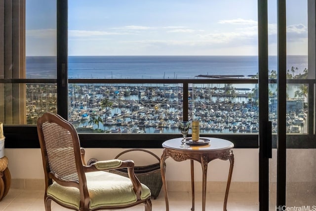 balcony featuring a water view