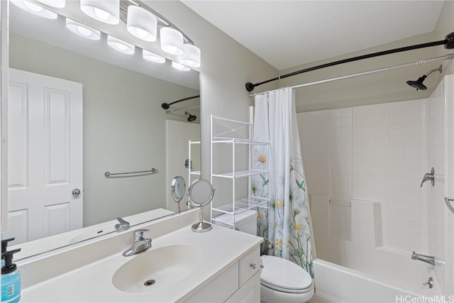 full bathroom with shower / tub combo with curtain, vanity, and toilet