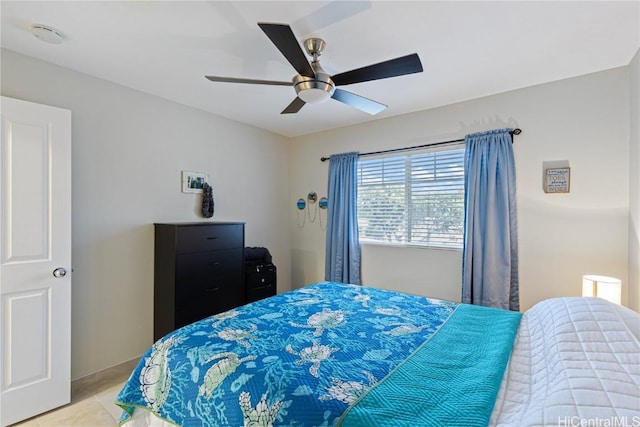 bedroom featuring light tile patterned flooring and ceiling fan