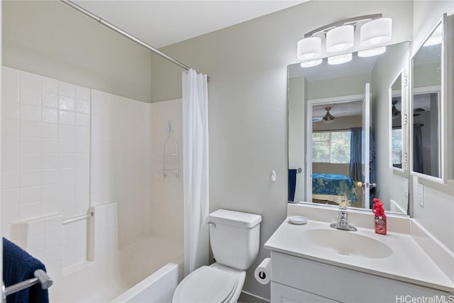 full bathroom with shower / bathtub combination with curtain, vanity, and toilet