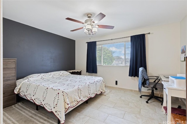 bedroom featuring ceiling fan