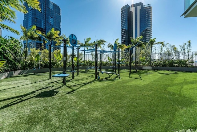 view of community with a playground and a lawn