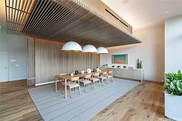 unfurnished dining area featuring light hardwood / wood-style flooring