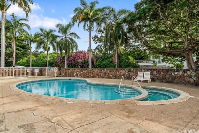 view of pool featuring a patio