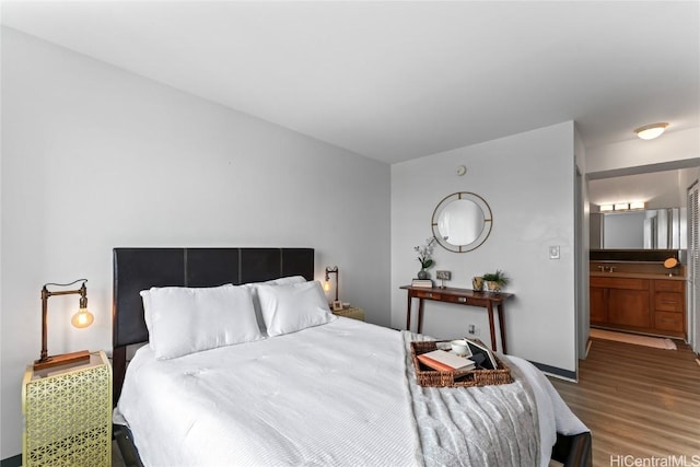 bedroom with wood-type flooring