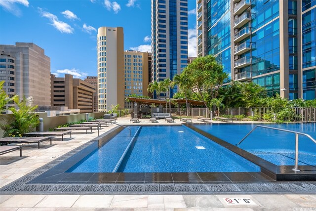 1200 Queen Emma St Unit 3608, Honolulu, HI 96813 - community pool with a view of city and a patio