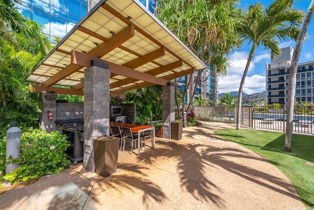 1200 Queen Emma St Unit 3608, Honolulu, HI 96813 - view of community featuring a patio area and an outdoor kitchen