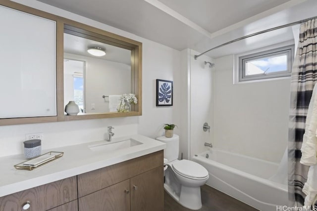 full bathroom featuring vanity, shower / bath combination with curtain, and toilet