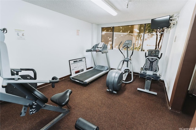 583 Kamoku St Unit 1907, Honolulu, HI 96826 - workout area featuring a textured ceiling
