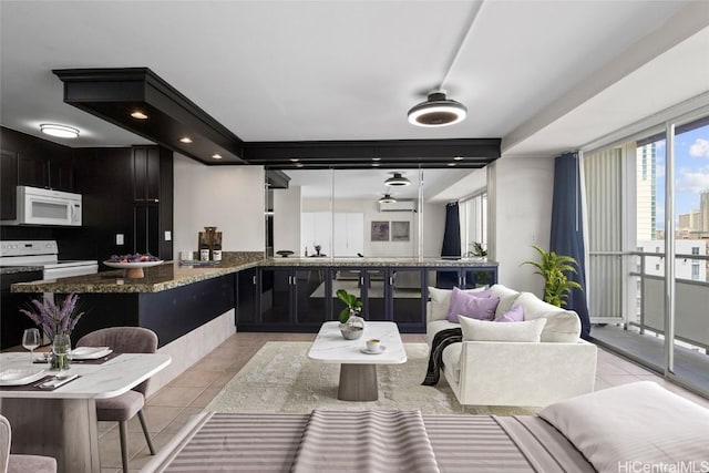 living room with light tile patterned floors