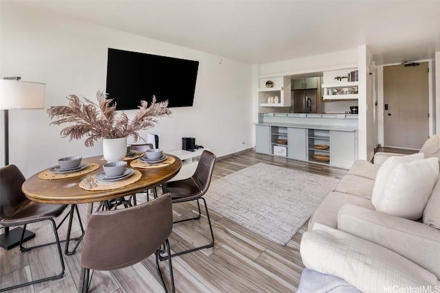 living room with light hardwood / wood-style floors