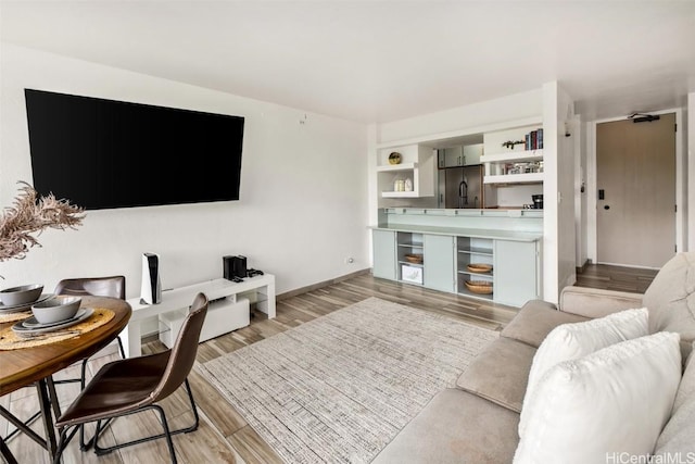 living room with light hardwood / wood-style floors