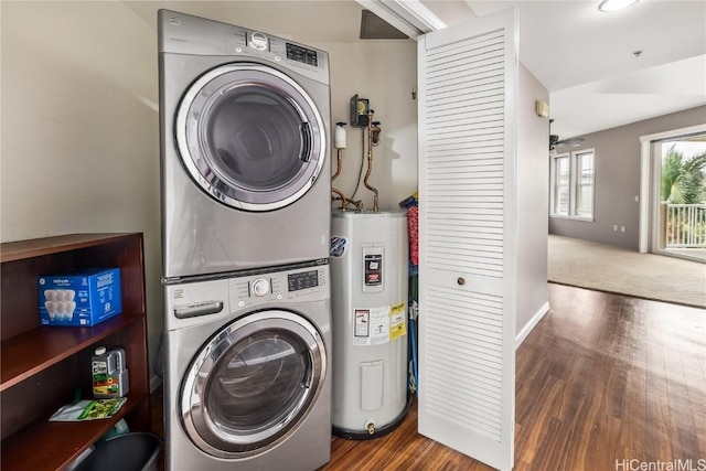 washroom with stacked washer / dryer, dark hardwood / wood-style flooring, and electric water heater