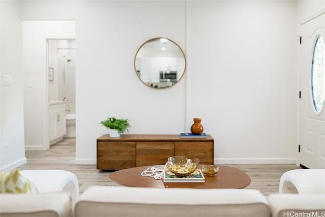 foyer entrance with light wood-type flooring