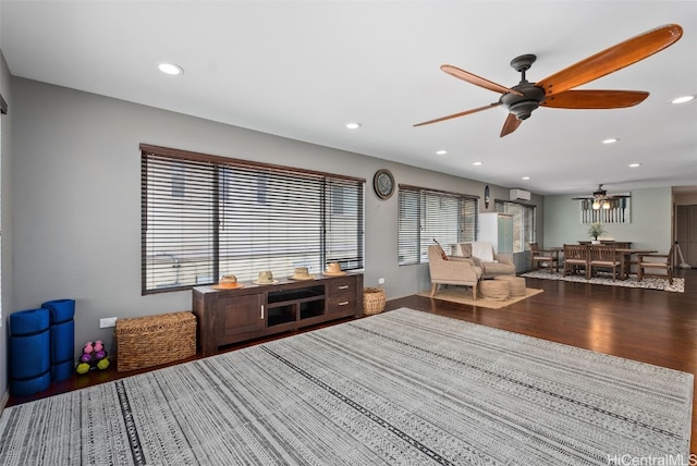 interior space featuring hardwood / wood-style flooring and ceiling fan