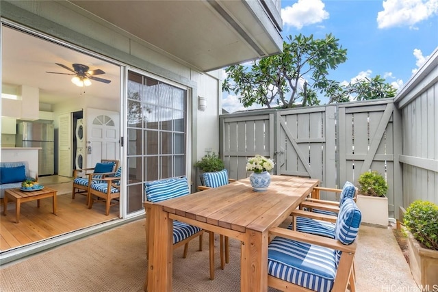 exterior space with ceiling fan