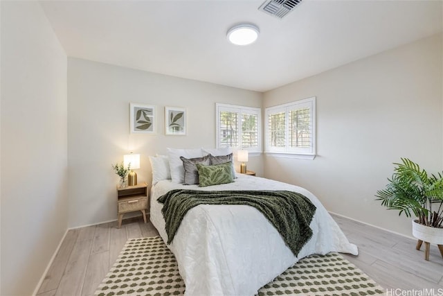 bedroom featuring light hardwood / wood-style flooring