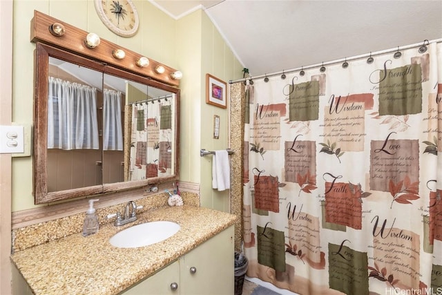 bathroom with vanity, ornamental molding, and shower / bathtub combination with curtain