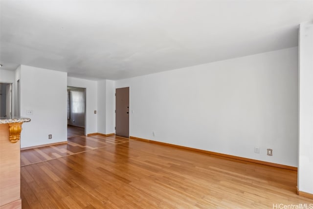 unfurnished living room featuring light hardwood / wood-style floors