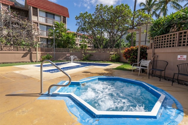 view of pool featuring a patio