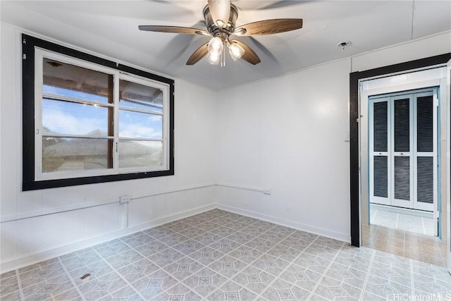 spare room featuring ceiling fan